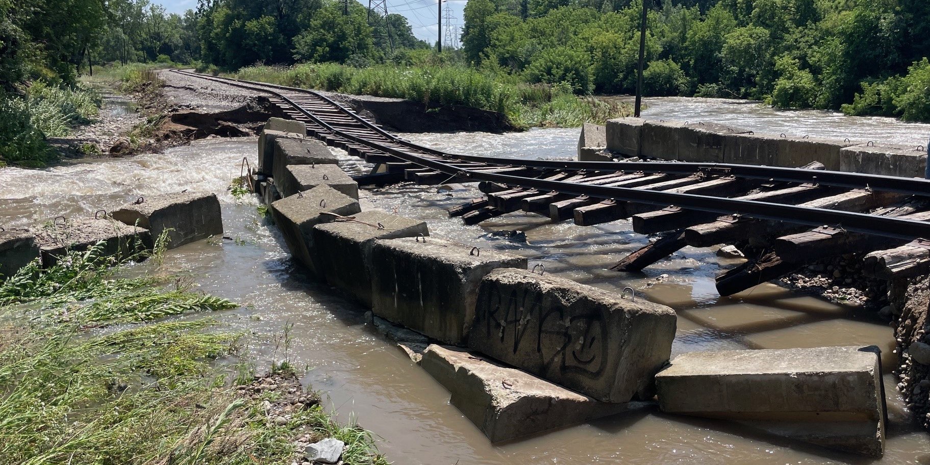 Damaged infrastructure from the July 2024 flood in Kitchener, Ontario